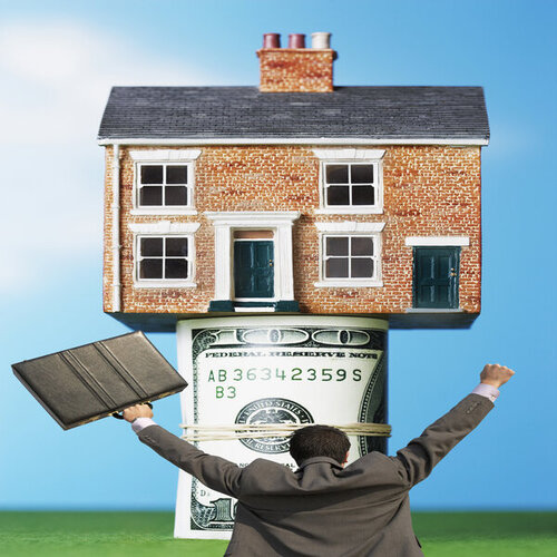 rsz_fix_and_flip Back view of victorious businessman with briefcase in front of house on money rolls